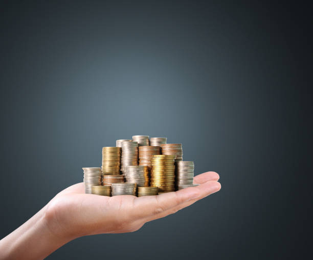 istock Hand human hand putting coin to money 834894254