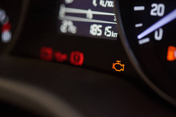 Check ingine icon Check ingine icon on modern car dashboard close-up engine failure stock pictures, royalty-free photos & images