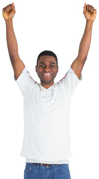 istock Excited handsome football fan cheering 834900656