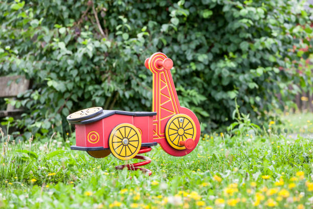 an spring swing On the playground this car is a spring swing playground spring horse stock pictures, royalty-free photos & images