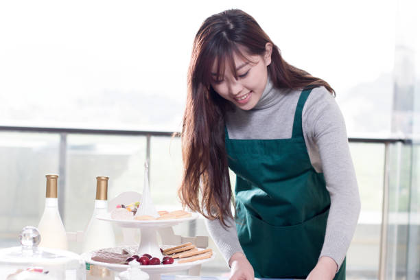 istock young beautiful asian woman working in modern dining room 834923448