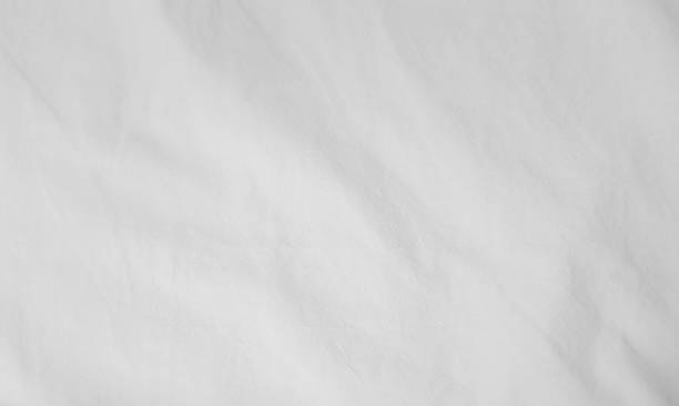 istock White delicate soft background of fabric or bedding sheet 834924440