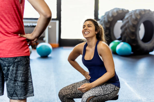 istock Cross Trainer Instruction in Gym 834929542