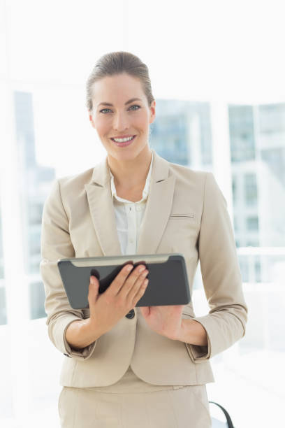 istock Beautiful businesswoman using digital tablet 834950486
