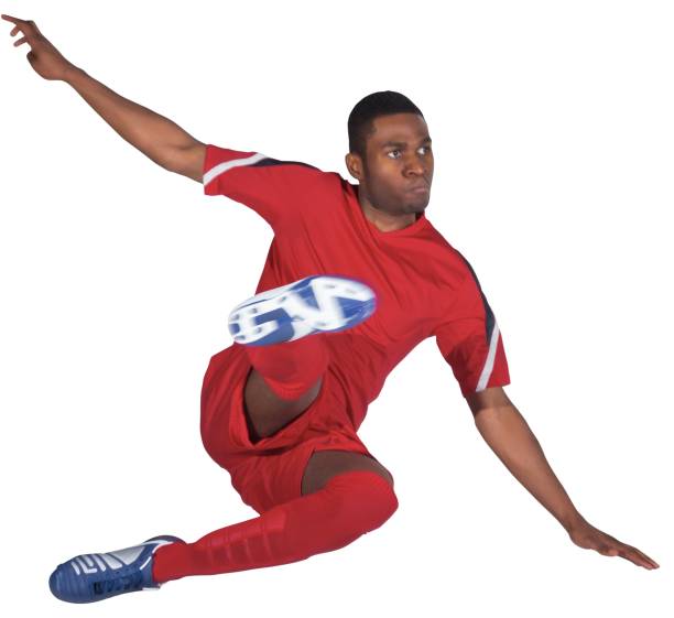 istock Football player in red kicking 834958250