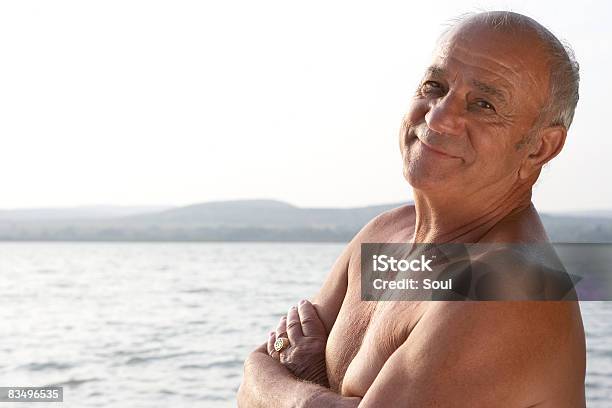 Portrait Of A Mature Man Stock Photo - Download Image Now - Shirtless, Beach, Senior Adult