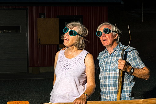 Senior couple watching a solar eclipse