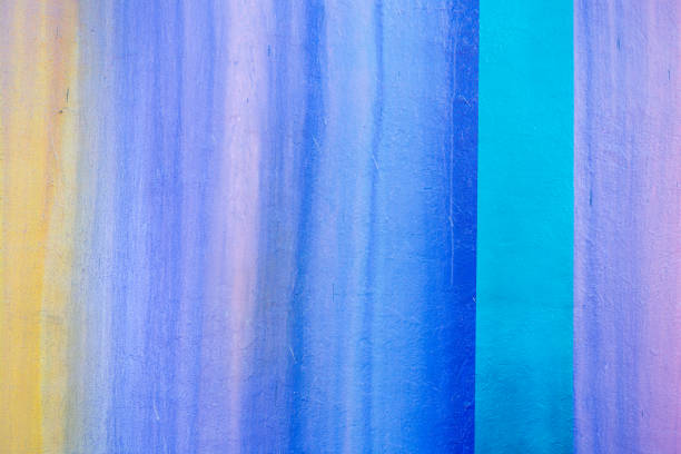 This is a close up, horizontal color photograph of a bold, colored, exterior, painted wall. Photographed with a Nikon D800 DSLR camera.