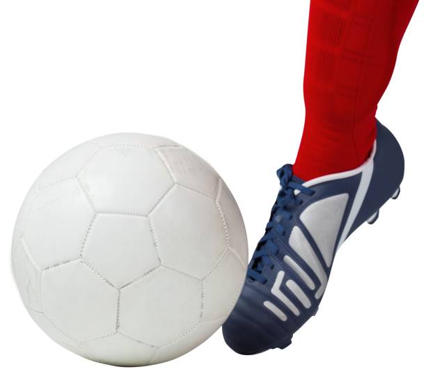 istock Football player kicking ball with boot 835004958
