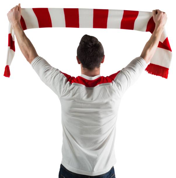 istock Excited football fan cheering 835008772
