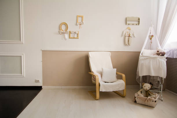 istock Interior of a nursery with a crib for a baby. 835010340