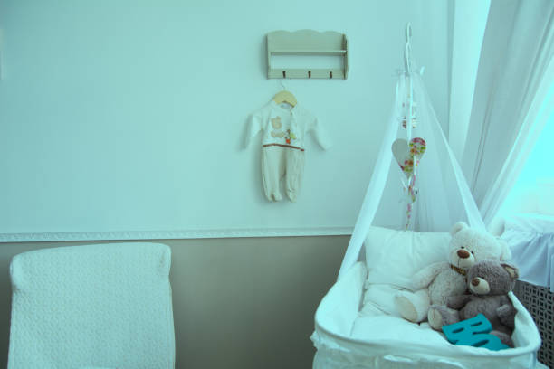 istock Interior of a nursery with a crib for a baby 835010538