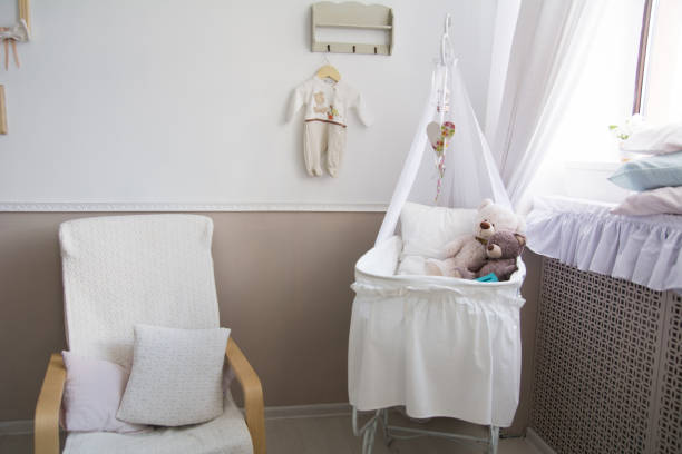 istock Interior of a nursery with a crib for a baby. 835010542