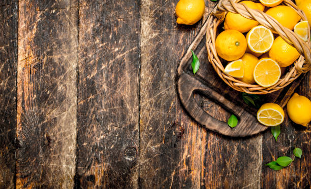 istock Fresh lemons in a basket. 835015360