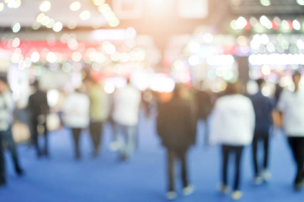 istock Abstract background blurred many people in the exhibition event. 835028274