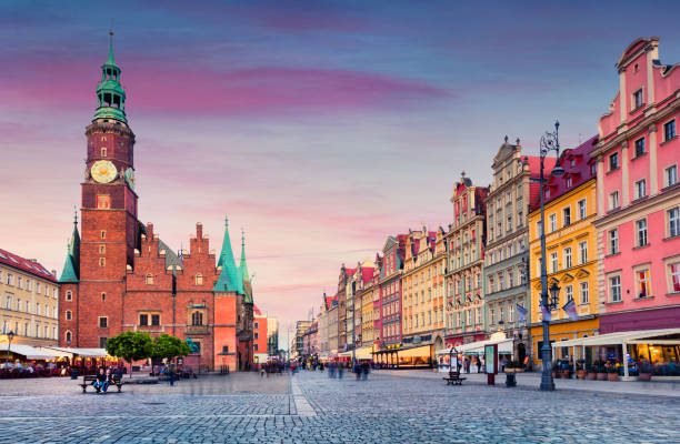 Colorful evening scene on Wroclaw Market Square with Town Hall. stock photo