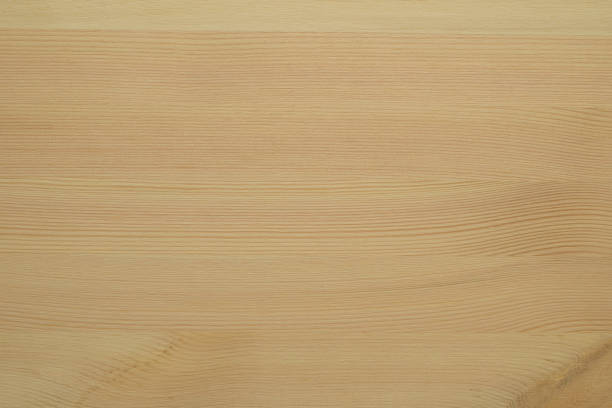istock Natural color wooden board with twig surface. 835043448
