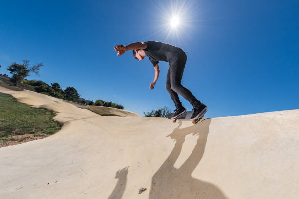 istock Skateboarder on a pump track park 835050426