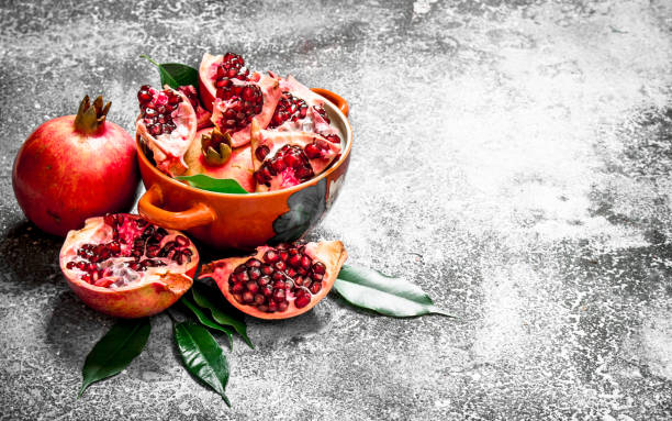 istock Pieces of fresh pomegranate in a bowl. 835051782