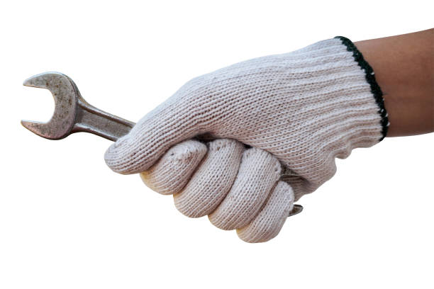 istock Mechanic hand hold wrench tool in hand isolated on white 835056572