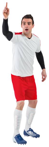 istock Football player in white raising his hand 835061730
