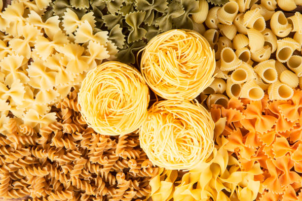 istock Close of uncooked macaroni . Mixed media 835062734