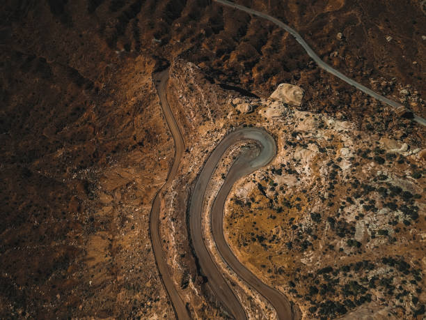istock Curvy mountain street in desert 835070432