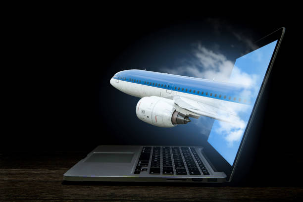 istock Airliner coming from laptop. Mixed media . Mixed media 835070624
