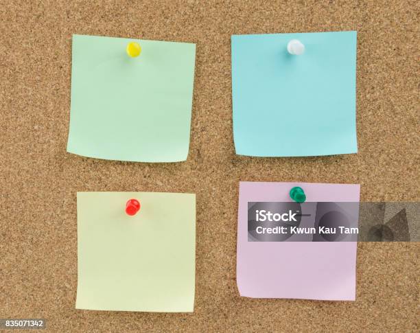 Sticky Note On Cork Board Background Stock Photo - Download Image Now - Adhesive Note, Blank, Blue