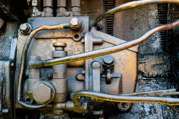istock Old dirty diesel tractor engine with soot and oil 835083596