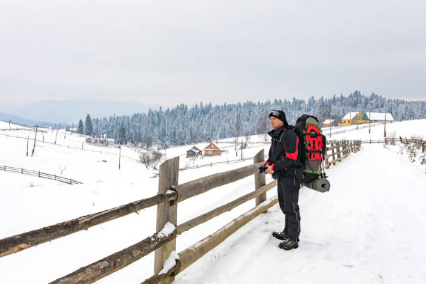 istock Tourist with backpack in Carpathian in winter 835097842