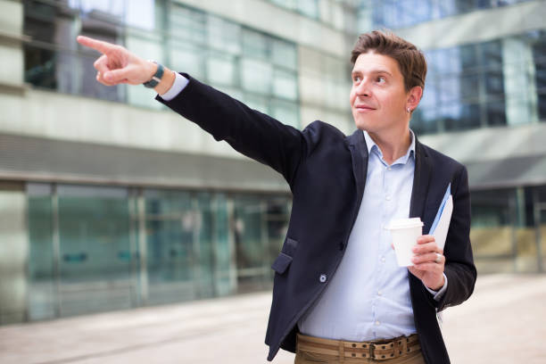 istock Smiling businessman with cup of coffee 835123864