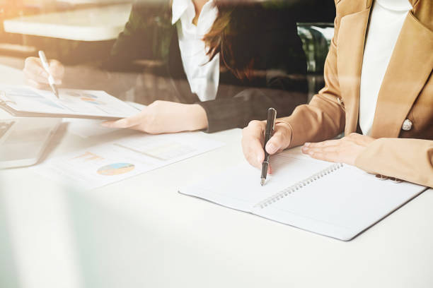 istock Business woman working at office with laptop and documents on his desk. Business concept. 835145708