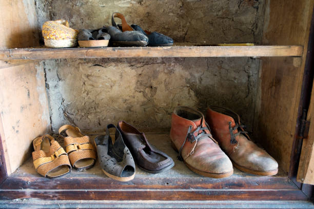 istock Wardrobe full of old shoes. 835151116