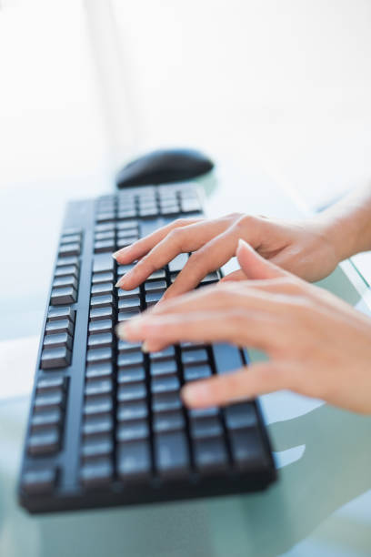istock Close up of hands typing on keyboard 835153856
