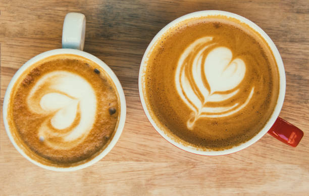 istock Two cups of coffee with beautiful latte art 835176706