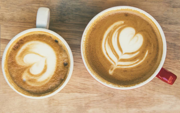 istock Two cups of coffee with beautiful latte art 835178694