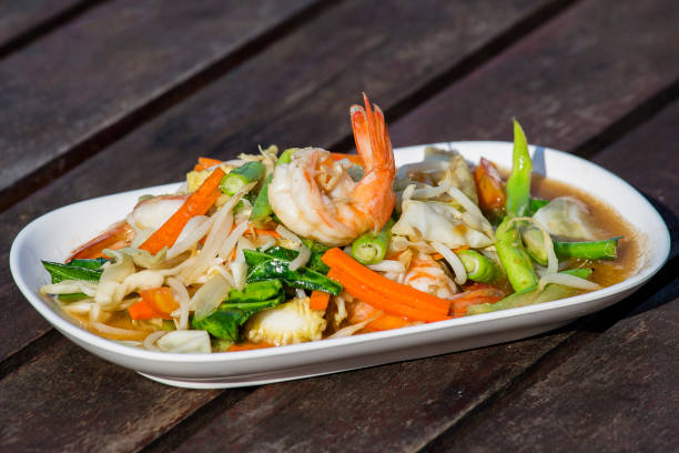 istock Thai food, seafood with vegetable spicy salad 835194568