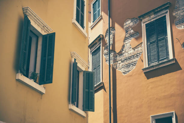 istock Windows of an old building in Italy 835194616