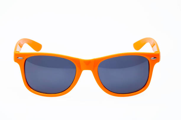 istock Studio shot on white background: orange sunglasses 835207374
