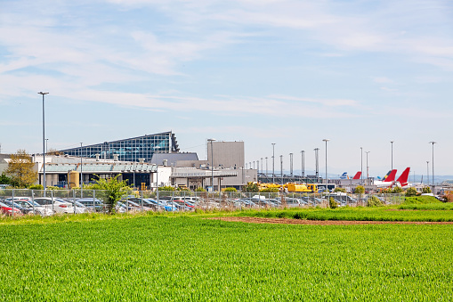 Airport Stuttgart, Terminal, exterior view with green field in foreground
