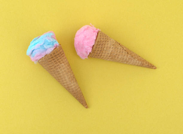 istock Pink and blue cotton candy in sugar cones. 835207652