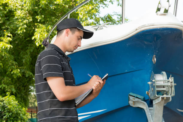 istock young mechanic checking the motor boat 835207824