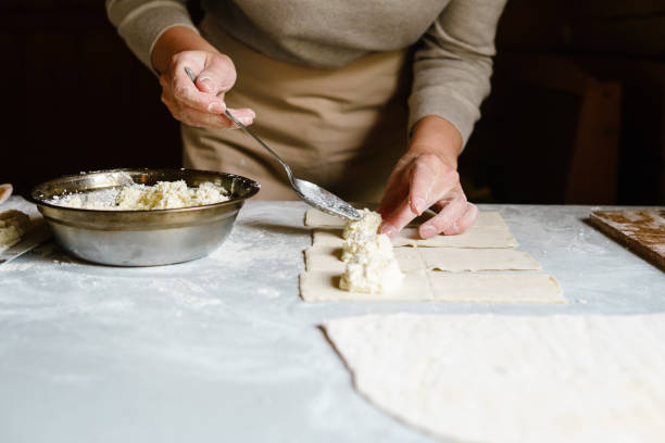 istock Woman making homemade ravioli. 835219626
