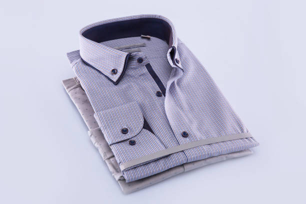 istock Two men's shirts folded on a white background. Isolated 835221074