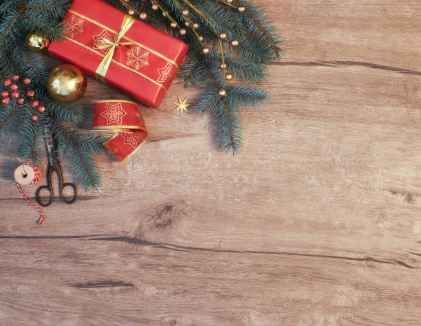 istock Christmas background with decorated fir twigs and gift box 835227388