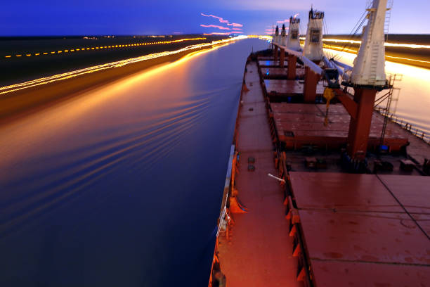 Ship Sailing Detroit Canal in Usa Ship Sailing Detroit Canal in Usa bulk carrier stock pictures, royalty-free photos & images