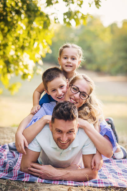 istock Modern family on the pile in nature 835231016