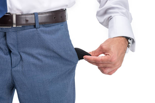 istock cropped view of poor businessman with empty pocket, isolated on white 835231622