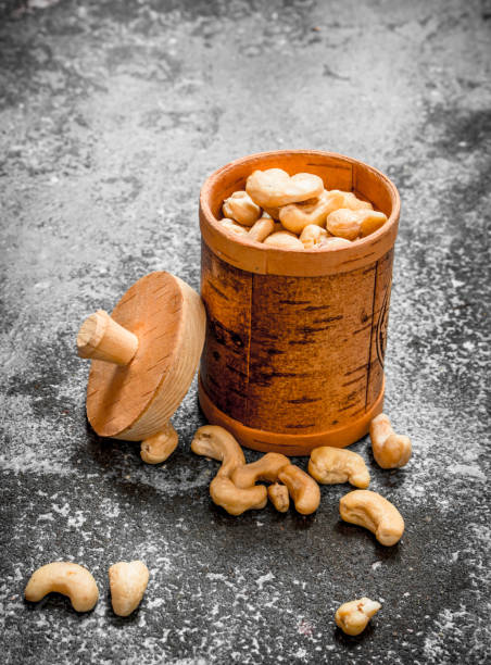 istock Cashew in wooden container. 835233638